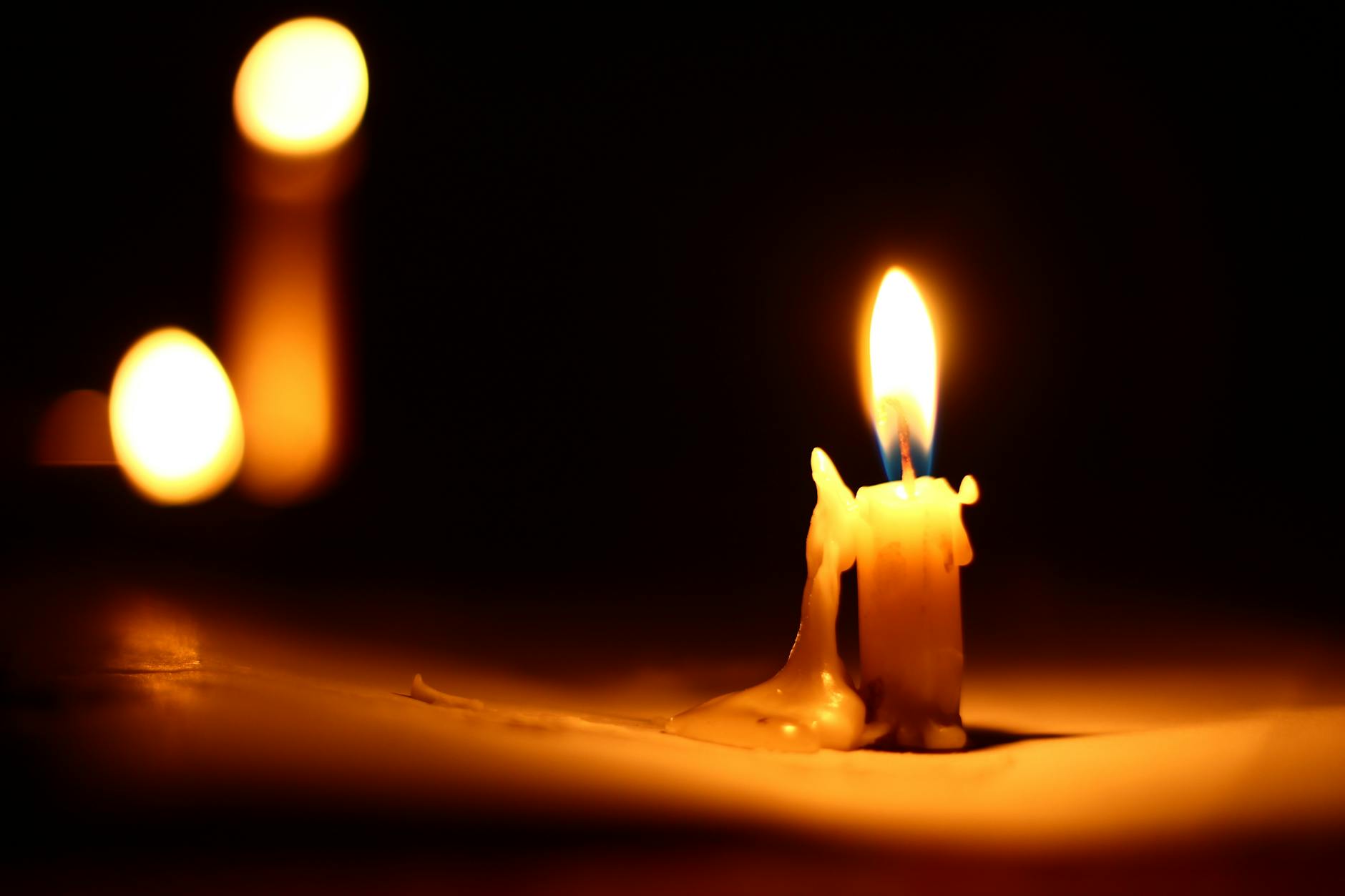 A single lit candle in a dark room, the quiet conditions for submitting a petition