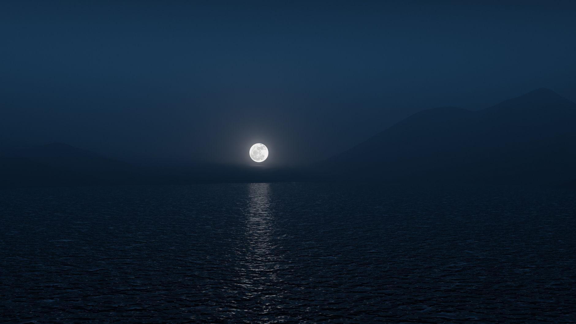 Full moon rising over a quiet sea — the operative peak of the lunar building cycle