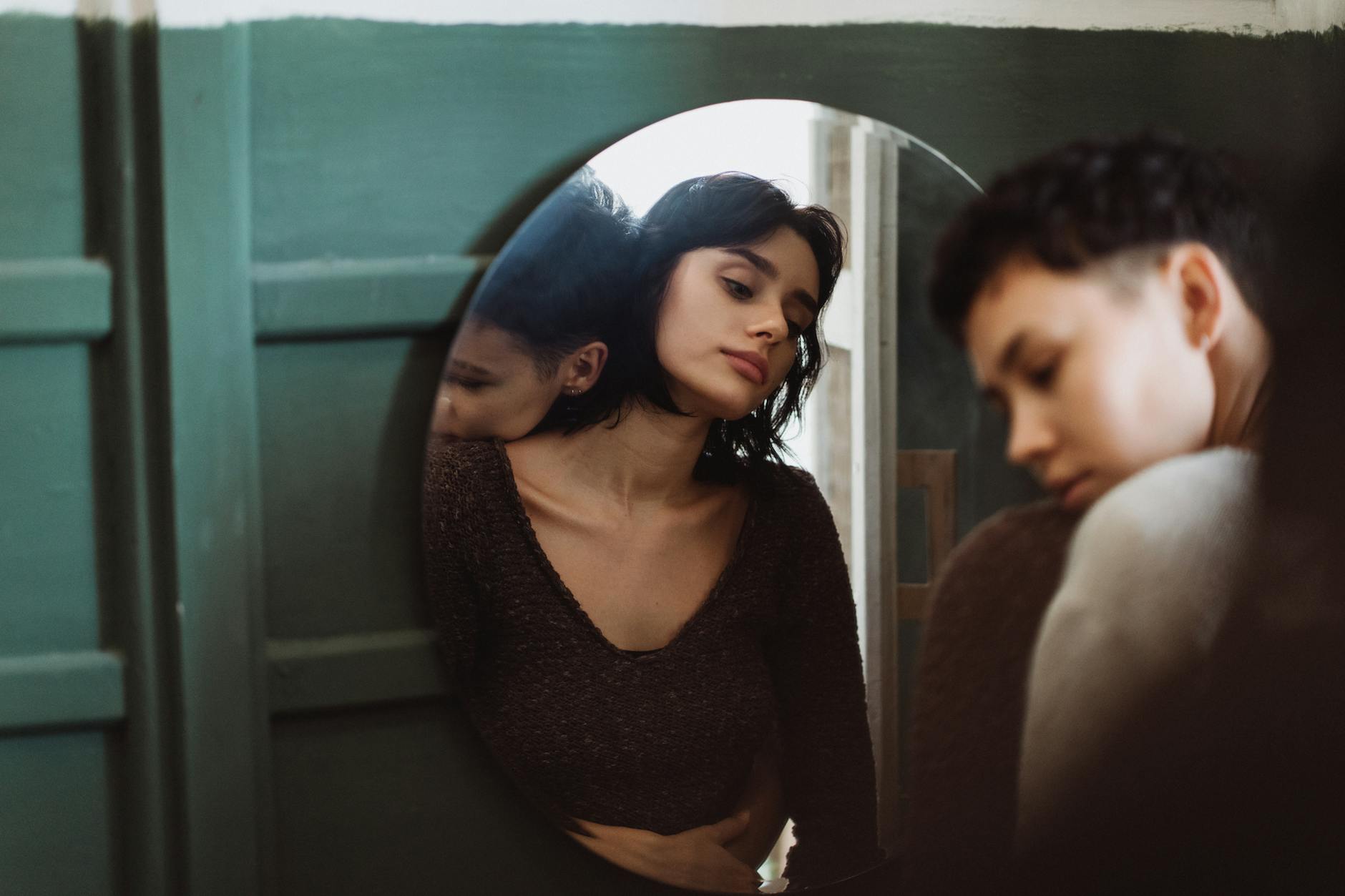 Knowing yourself spiritually — a person facing their own reflection, telling self-knowledge from self-story