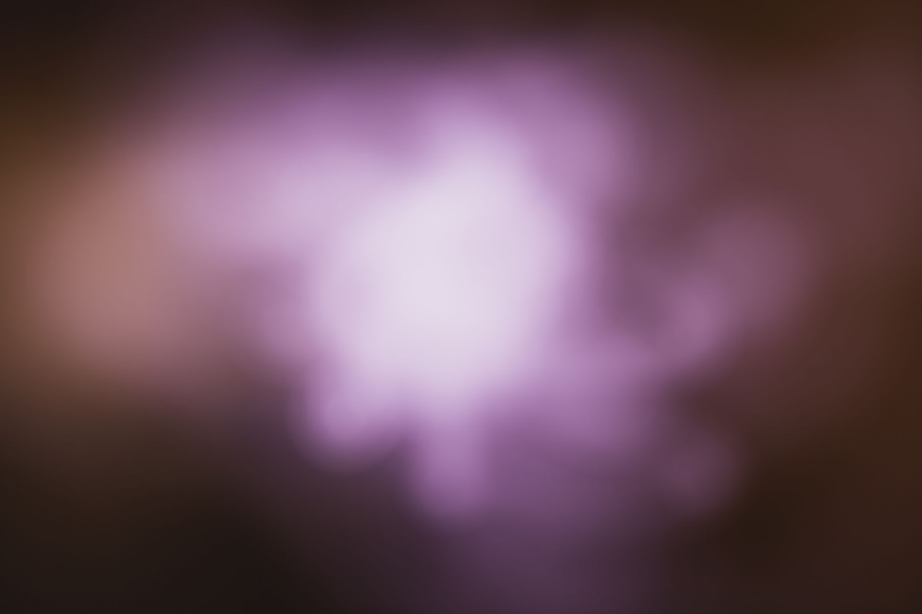 Two overlapping fields of soft purple light, suggesting how inner climates interact at the field level