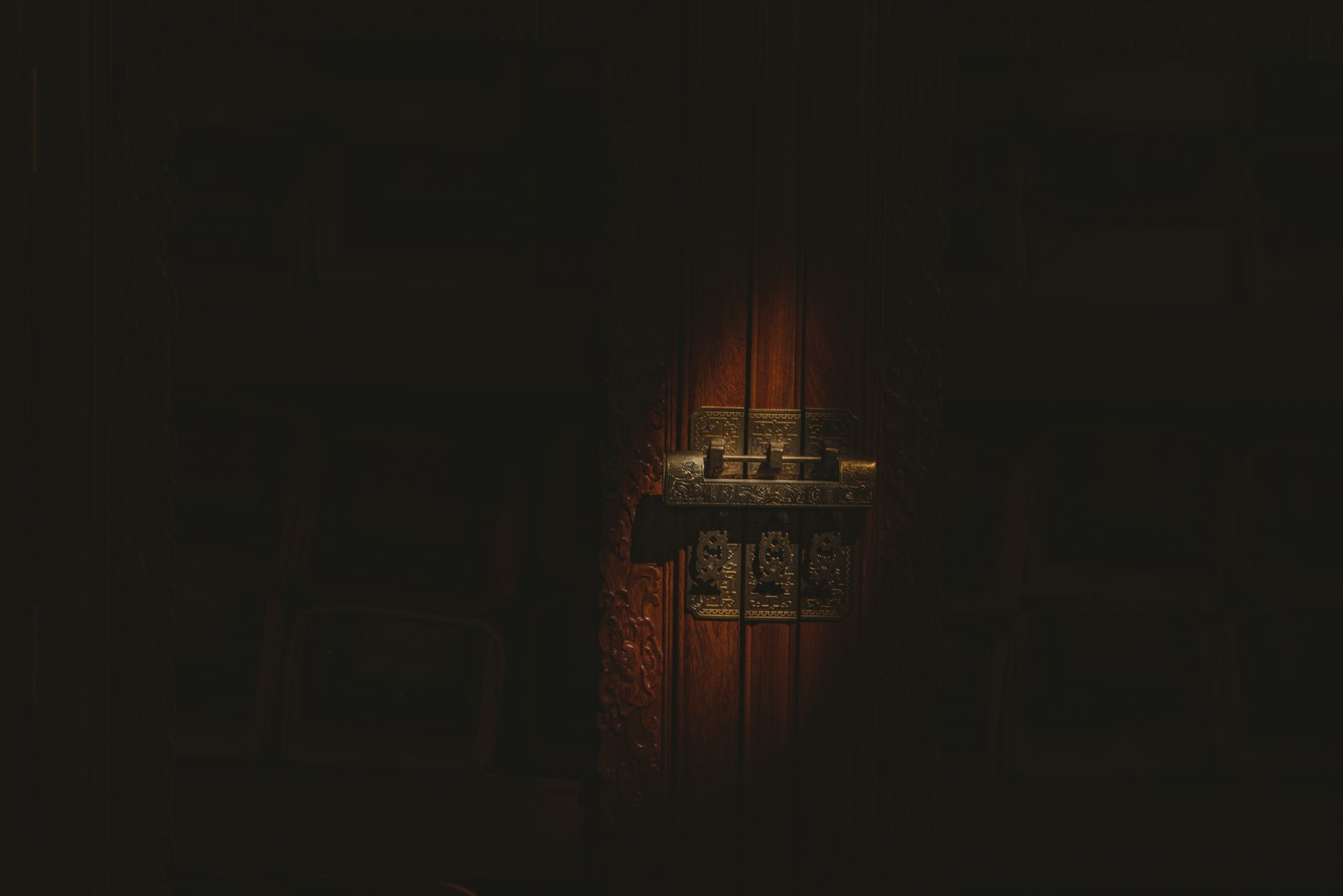 Threshold of an old wooden doorway at dawn — the sealing of a field after the resolution work