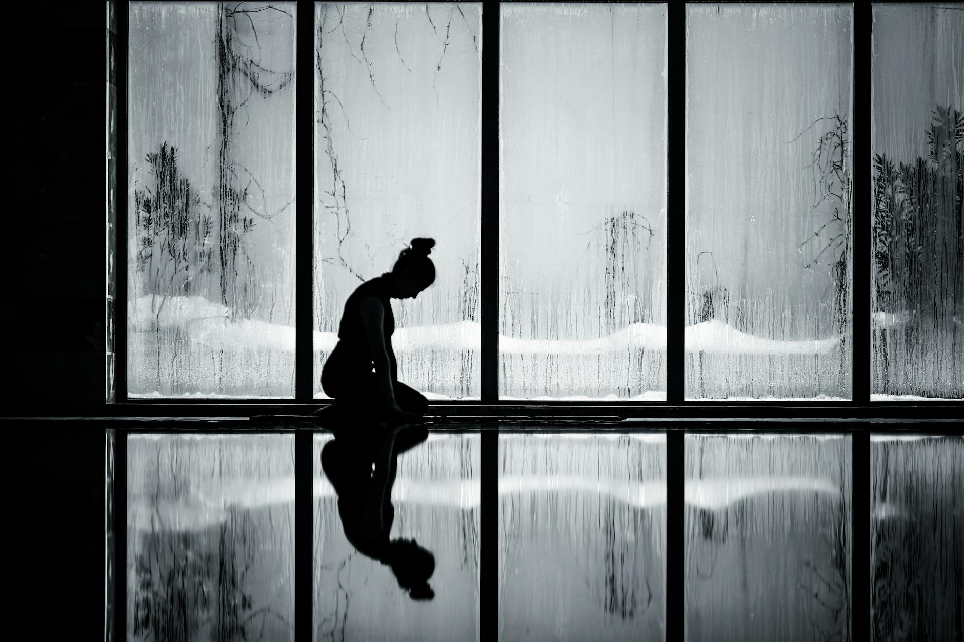 Silhouette of a person in stillness — placing attention deliberately through daily practice